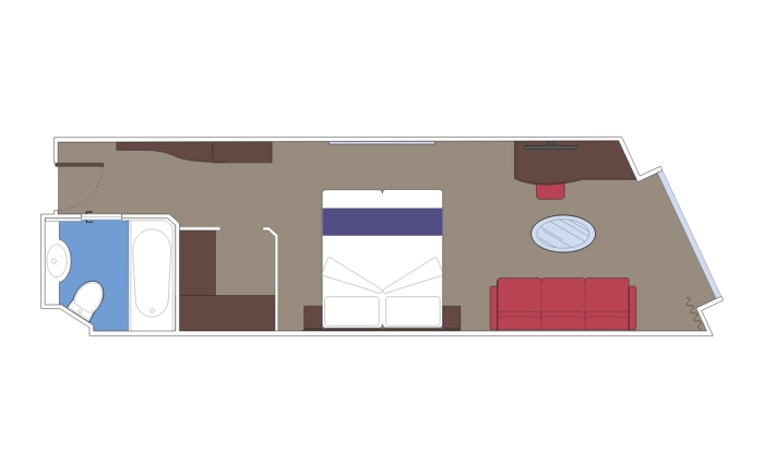 Spacious cruise cabin layout with bed, sofa, table, and private bathroom | MSC Cruises